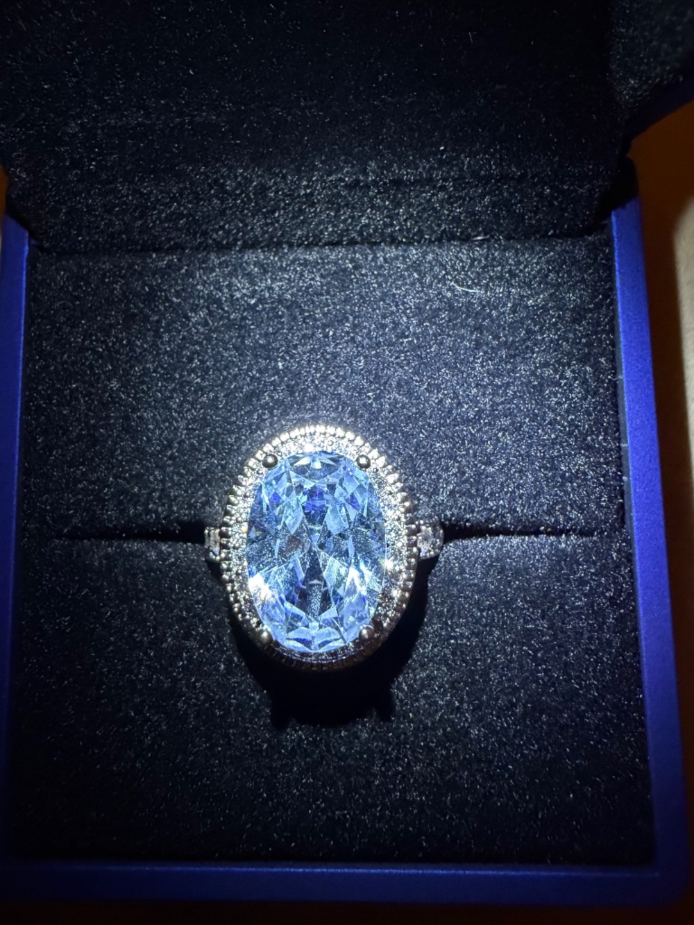 6.6 Carat White Sapphire Ring: Oval-cut Milgraine/Halo, Silver-plate